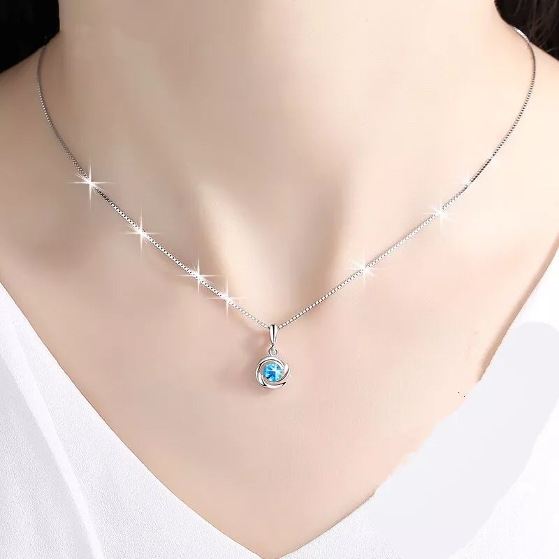 Blue Crystal Swirl Pendant Necklace
