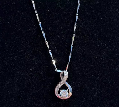 Crystal Swirls Twist Pendant Necklace in 925 Sterling Silver with Amethyst Stone