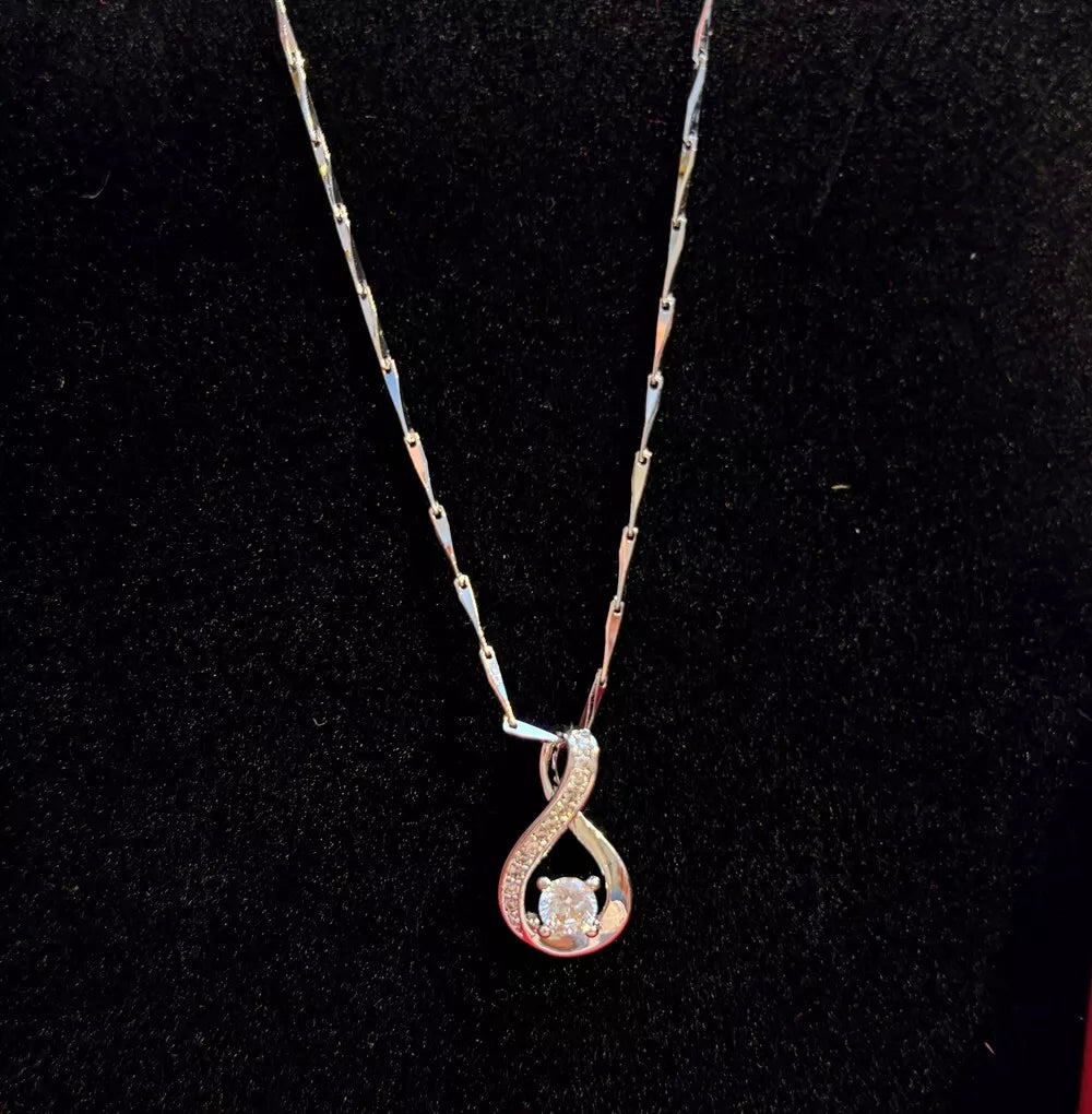 Crystal Swirls Twist Pendant Necklace in Sterling Silver with Amethyst Stone