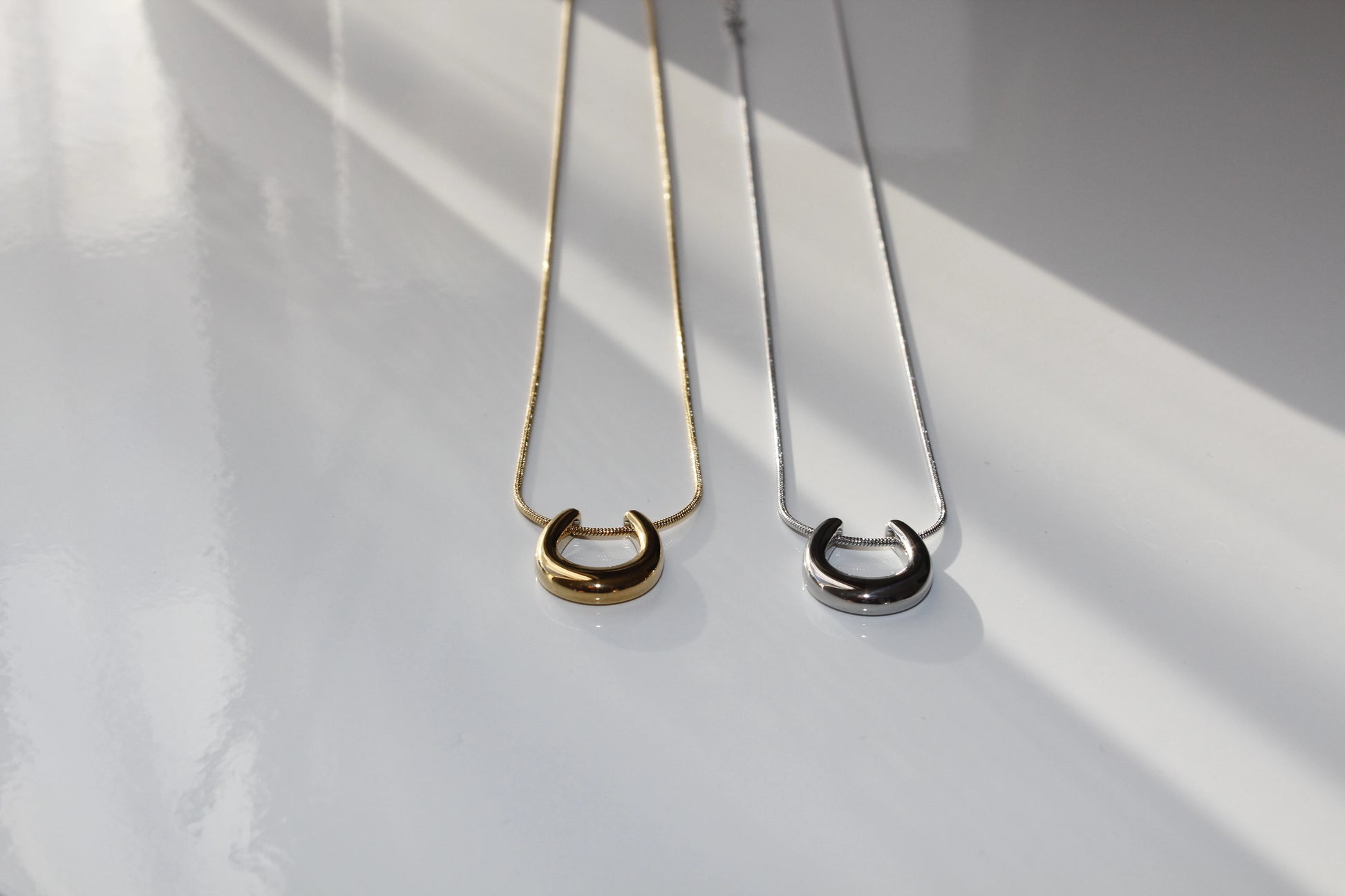 U shaped gold and Silver necklace